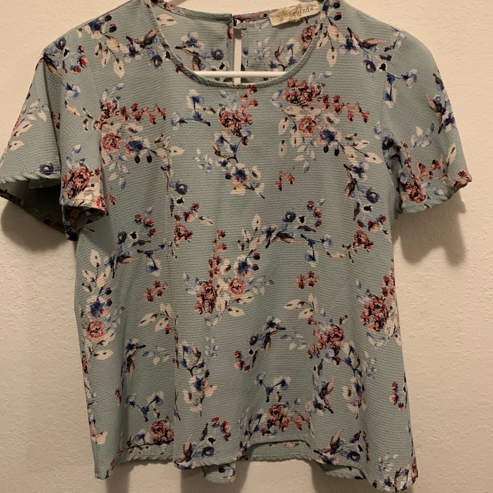 Women’s light blue floral blouse